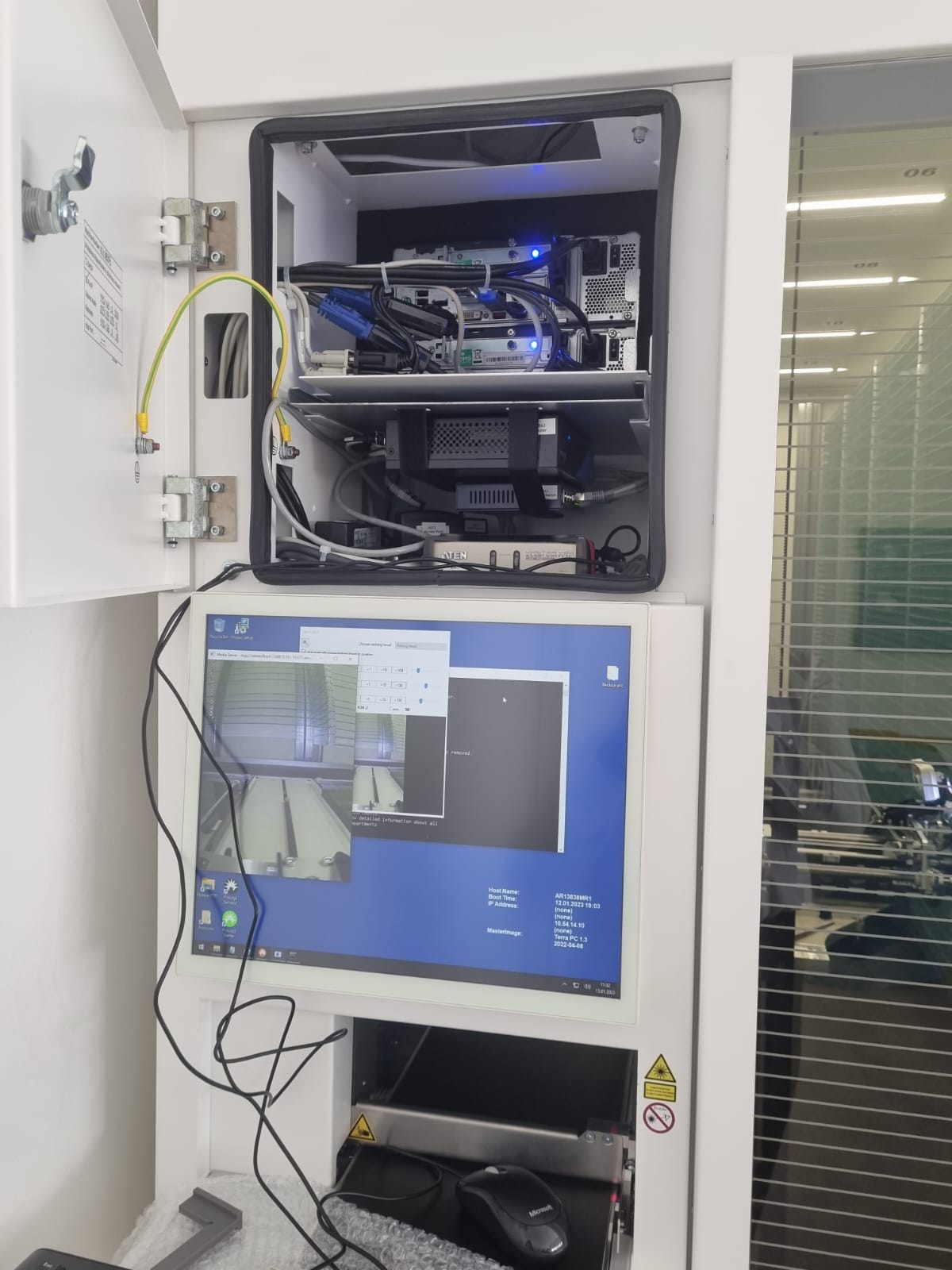 Rowa Technologies robot arm operating between shelves